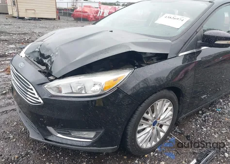 2017 Ford Focus Titanium z USA, uszkodzony, nr VIN 1FADP3N25HL349051